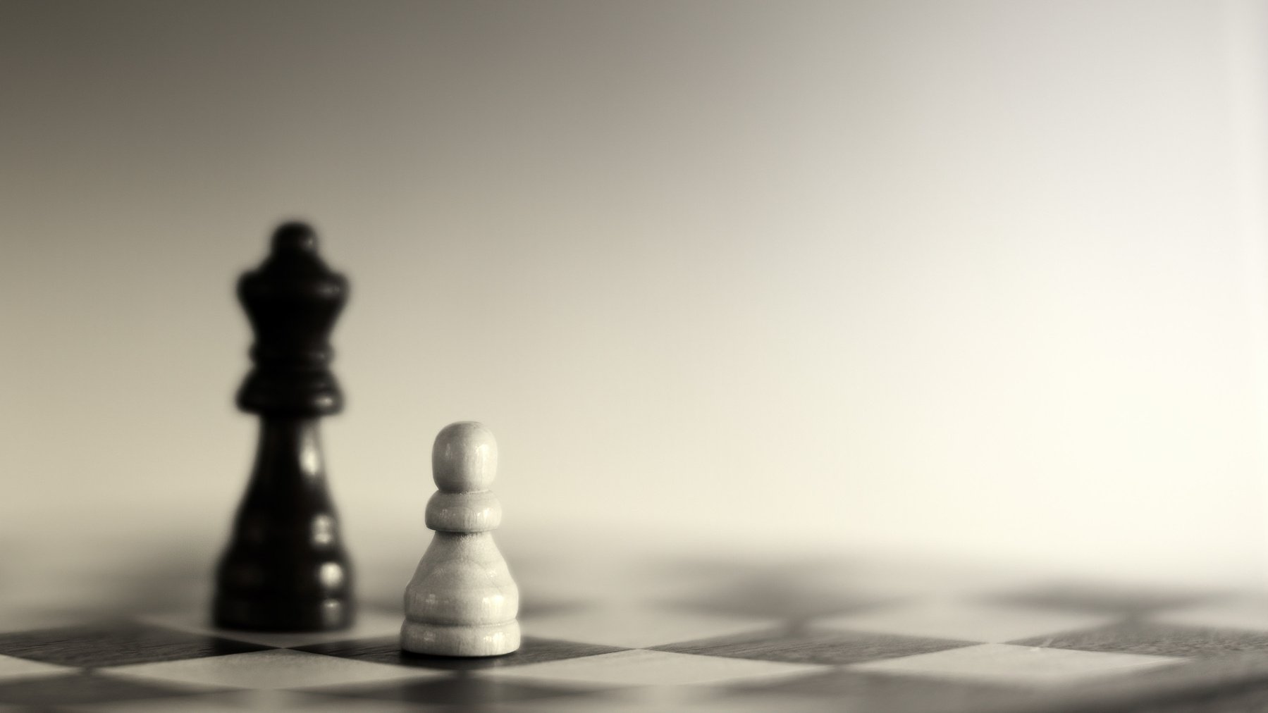 Grayscale Photography of Two Chess Pieces